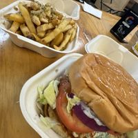 The buffalo chicken burger and garlic fries. Yummmmmm!   at Mission Burger Co in Austin