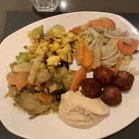 Polpettine, seitan con patate, misto di broccoetti, finocchi e carote, hummus   at Ops Cucina Mediterranea in Rome