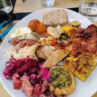 Lasagna, croquette, cabbage salad, beet salad, meatballs, veal roll, burger, cheese at Ops Cucina Mediterranea in Rome