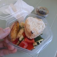 Baked potato, onigiri and salad at Verde Vida - Rua Formosa in Porto