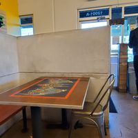 Inside seating (diggin the artwork) at Tacodeli - North in Austin