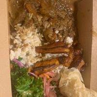 Marinated king oyster mushrooms and jackfruit are seared and simmered in a savory Not-Tails sauce.  at Ital Vegan in Jacksonville