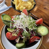 Managed to find a yummy salad and chips 😊  at The Grape Escape Cafe in Richmond