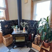 Wood fireplace in Dining area   at Pas a Pas in Miyota