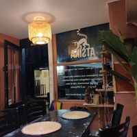 Welcoming on a very wet night. at Atsika in Dieppe