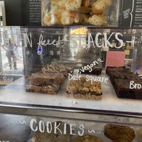 The unlabeled bar second from left is also vegan, they make it in house. The other three are from the Strawberry Blonde bakery.  at North Folk Cafe in Perth