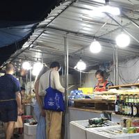 The stall has no sign. Look for the stall with numerous vegetable and noodle dishes.  at Vegetarian Buffet - Street Food Alley in Luang Prabang
