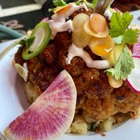 Surprisingly delicious roasted cauliflower! So flavourful and the bed of rice was perfect   at Bar Sofia in Halifax