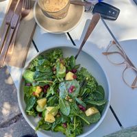 Mango + pomegranate salad and an iced coffee  at Convoy Commune in Merewether