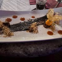 Dessert - Chocolate Cheesecake Mousse, Rich Caramel, Goldenberry (Vegan) at VINIA Wine & Kitchen in Winter Park