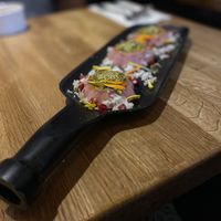 Panna cotta pétale de rose, éclats pistache qui goûte le ciel 🤌  at Tula in Montreal