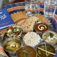 Vegan lunch - the thali for lunch is a wonderful assortment of curries, daals, and cumin rice. Superb, flavourful and healthy!  at Tula in Montreal