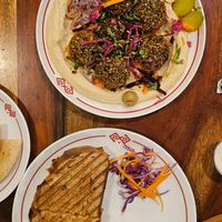 Vegetable sandwich and felafel&hummus plate with some pita at Curious Life Coffee Roasters BLUE  in Jaipur