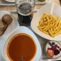 Tamato soup with a side of fries, bread and mango coconut chia pudding for dessert.   at Après-ski bar PEKYLAND in Vysoke Tatry