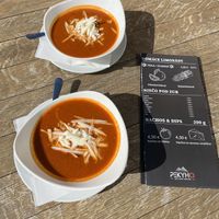 Tomato soup with vegan mozzarella   at Après-ski bar PEKYLAND in Vysoke Tatry