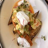 Sharing plate of Eggplant & Tempeh  at Sisu in Picton