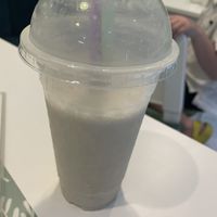 Peanut butter and banana smoothie with oat milk (picture taken half way through meal)  at Fresh & Fit Cafe in Phuket