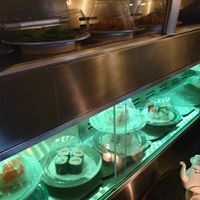 Running sushi with two levels. First level is hot food, second level is cold food at Bo's Viet Deli in Munich