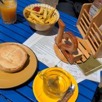 Fries with vegan lentil and bean pie at Gato Legal Coffee Roastery in Ponta Do Pargo
