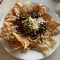 Vegan nachos with vegan cheese and vegan sour cream  at The New Leaf Cafe in Murwillumbah