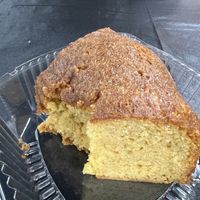 Moscato cake with a bite out of it and it is sooo goodd  at Love in Action Cafe - Maybe closed in Charlotte