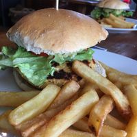 Hamburguesa de garbanzo palta tomate lechuga   at La Base Restaurant in Puerto Varas