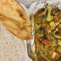 Tofu curry (#20) NOTE: double check that the naan is vegan. Everything on their menu is clearly marked vegan but they put this naan in for free so just double check before u order  at Lemongrass in Tucson