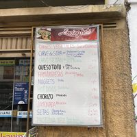 Sign out front at Loving Hut - Titikaka in Puno