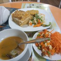 Seaweed soup, bean salad, fried seitan and a potato-tofu-potato pie at Loving Hut - Titikaka in Puno