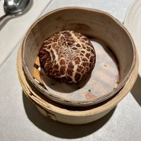 There are 2 vegan buns: mushroom and black sesame. This is surprisingly not the mushroom one (sesame paste filled).  at Fruitful Food 果然匯 in Taipei