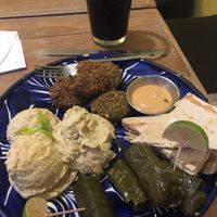 mixed plate of hummus, falafel and grape leaves at Habibti Falafel in Guanajuato