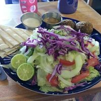 Salad with falafel and pita bread at Habibti Falafel in Guanajuato