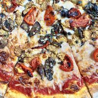 Vegan cheese, vegan tempeh “sausage,” mushrooms and tomatoes   at Whole Foods Market in Richardson