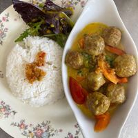 Vegan balls in curry sauce and steamed white rice  at Born Appetite in Minehead
