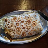 Eggplant and potato curry in a roti at Maurya Indian Twist in Woodstock