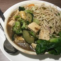 two views of the delicious black pepper sauce with tofu and veggies with noodles. at Veganesha  in Dubai