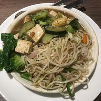 two views of the delicious black pepper sauce with tofu and veggies with noodles. at Veganesha  in Dubai
