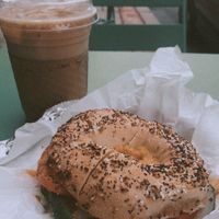 Coffee with hummus and veg bagel  at The Bagel Bar Cafe in Kutztown
