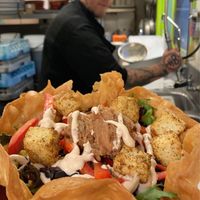 Specials menu taco bowl with tofu and the guy who made it  at Saucony Creek Brewing in Kutztown