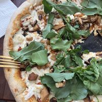 Baby blue pizza with super tasty shiitake  at Vegan Spot by Revolution in Playa Del Carmen