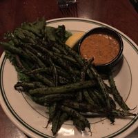 “Blackened” green beans were amazing. Flavors I haven’t tasted in years and it was perfect. Definitely a little kick to them.  at New World Bistro Bar in Albany