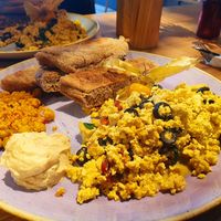 Scrambled tofu with dried tomatoes, olives, spinach and bread at Mr. Bens Cafe in Dusseldorf