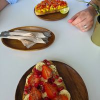 Mexican avacado toast on top and cheeky monkey toast on the bottom, both vegan at Sprout in Muscat