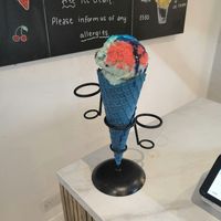 Candyfloss and cookie monster with bubblegum sauce and sherbert in a blue (bubblegum I think) cone at Lick in Bakewell