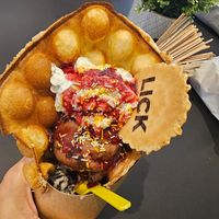 Vegan bubble waffle, icecream, whipped cream, sprinkles, sauce at Lick in Bakewell