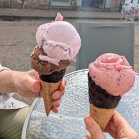Jaffa cake + parma violet ice cream, and raspberry and dark chocolate ice cream, on choc dipped cones at Lick in Bakewell