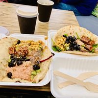 Huge flatbreads overflowing with goodness !  at Roots Cafe in Perranporth