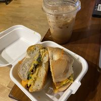 “The OG” vegan bagel sandwich and a “love potion” oat milk latte    at Mimi's on Lincoln in Chicago