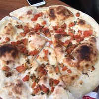 Starter : plain pizza dough with tomato  at L'Osteria - La Part-Dieu in Lyon