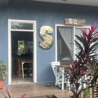 Entrance to Stowaway. Blink and will miss it as it is in a townhome complex   at The Stowaway Gastrobar in Roatan